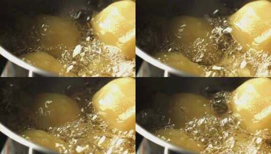 在锅里煮小土豆煮熟沸腾美食高清在线视频素材下载