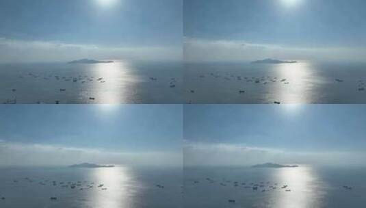 深圳前海湾海洋风景航拍海面阳光渔船货船高清在线视频素材下载
