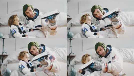 爸爸和女儿玩宇宙飞船的浪漫和家庭时刻，两高清在线视频素材下载