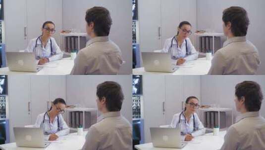 治疗师在医院与男性交谈高清在线视频素材下载