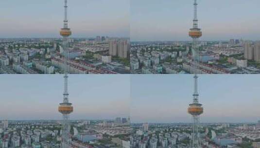 上海嘉定电视塔城市傍晚夕阳日落航拍高清在线视频素材下载