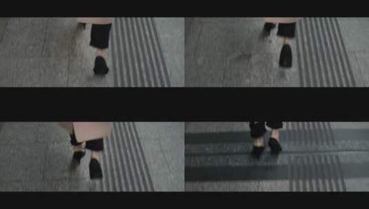 女人穿高跟鞋在人行道行走特写高清在线视频素材下载
