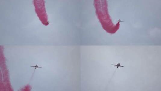 飞机留下的红色烟雾高清在线视频素材下载