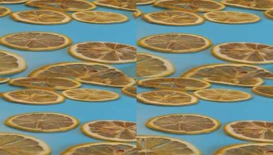 蓝底柠檬片柠檬干干柠檬水果高清在线视频素材下载