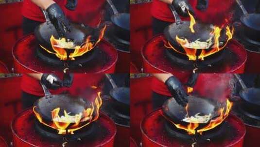 在大火的锅里做饭的人高清在线视频素材下载