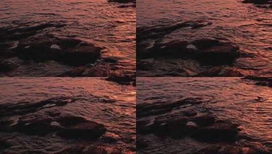 8k实拍海上日出时的海边礁石高清在线视频素材下载
