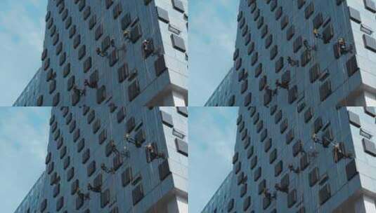城市美容师蜘蛛人高空作业清洁大厦外墙高清在线视频素材下载