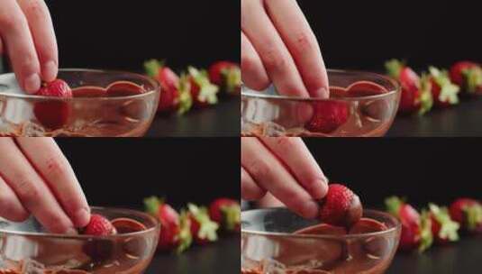 用草莓蘸巧克力酱的画面特写高清在线视频素材下载