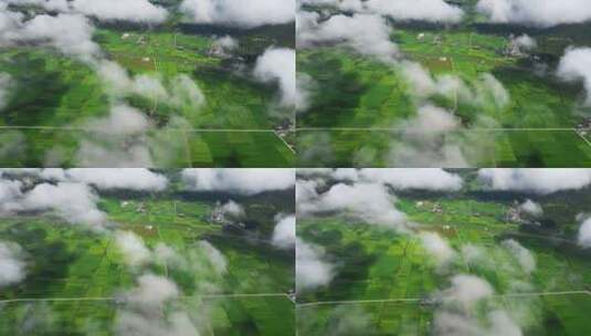 云雾下的绿色田野山川高清在线视频素材下载
