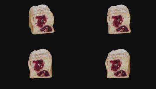 里面有樱桃果酱的面包高清在线视频素材下载