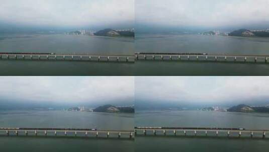 列车驶过城市跨江大桥高清在线视频素材下载
