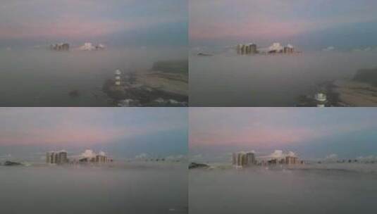 自然风光灯塔大雾海面日出航拍高清在线视频素材下载