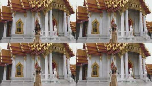 泰国曼谷，一名妇女在寺庙自拍高清在线视频素材下载