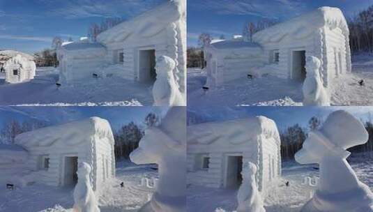 雪地中的雪雕小屋和动物造型高清在线视频素材下载