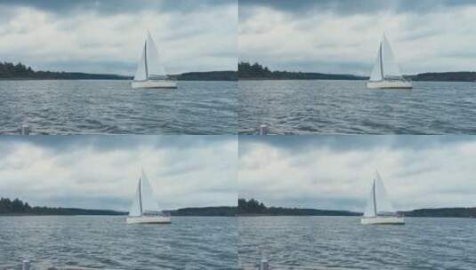 白色帆船在海面上游行高清在线视频素材下载