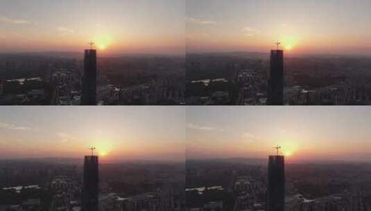 航拍城市高楼吊塔日落夕阳晚霞高清在线视频素材下载