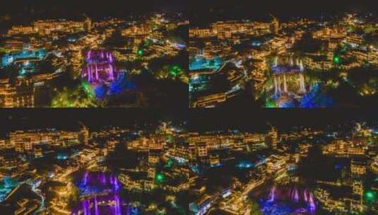 神秘湘西瀑布上的古镇芙蓉镇夜景延时摄影高清在线视频素材下载