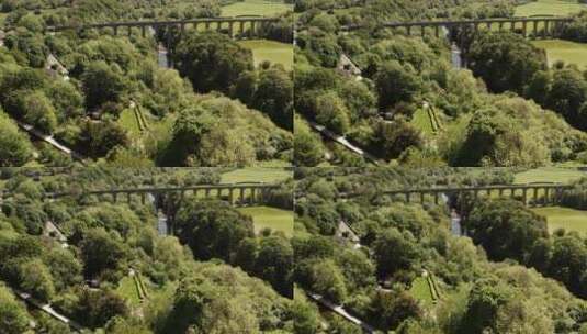 英国威尔士庞特基斯尔特高架水道与葱郁树林高清在线视频素材下载