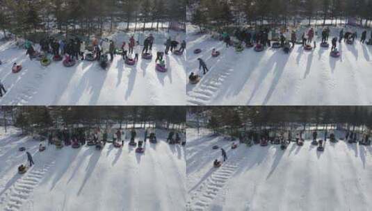 人群在雪地的小土坡往下滑dlog高清在线视频素材下载