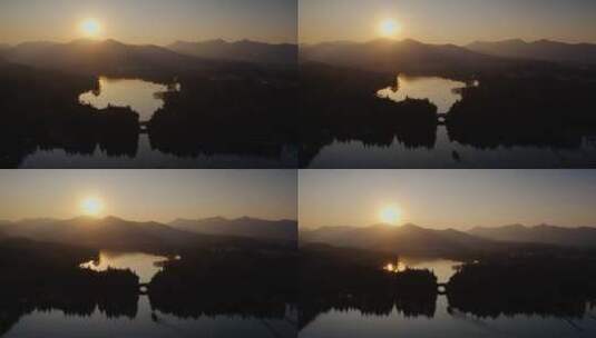 航拍西湖的金色夕阳美景高清在线视频素材下载