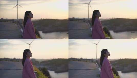 女孩黄昏时于路边眺望远方高清在线视频素材下载