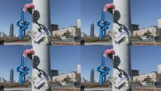 济南泉城广场“泉标”建筑，春天鲜花围绕高清在线视频素材下载