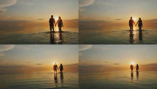 情侣在夕阳的海边漫步高清在线视频素材下载