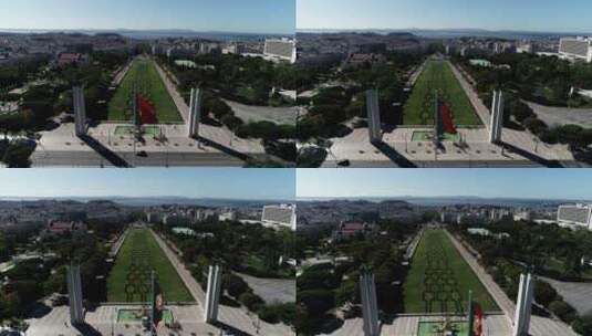 里斯本爱德华多七世公园迎风飘扬的葡萄牙国旗鸟瞰图高清在线视频素材下载