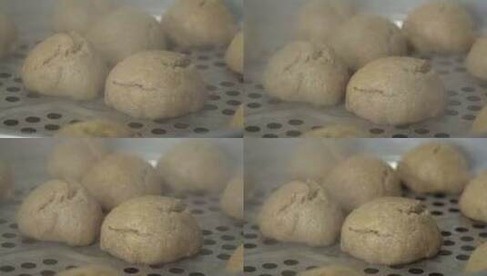 4K传统蒸小麦馒头麦粑粑实拍视频高清在线视频素材下载