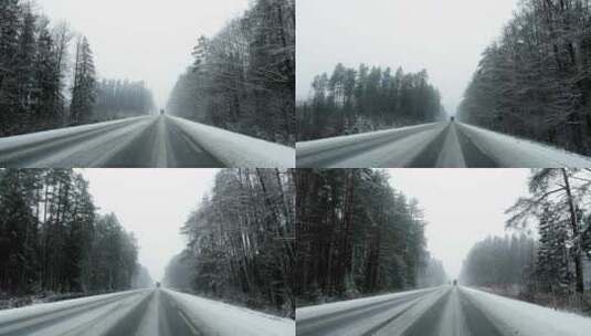 危险和可怕的POV驾驶在一辆卡车后面在雪暴期间在森林道路在白天高清在线视频素材下载