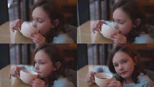 女孩在咖啡馆喝热茶高清在线视频素材下载