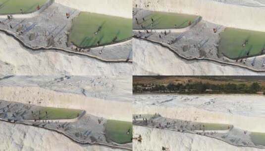 游客和游客在帕穆卡莱的碳酸钙石灰华上散步高清在线视频素材下载