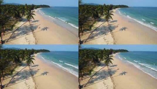 一对夫妇在泰国春蓬省度假白色热带海滩与棕榈树瓦莱恩海滩高清在线视频素材下载
