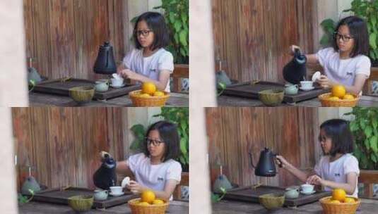 4K升格实拍在中式庭院茶道沏茶喝茶的女孩高清在线视频素材下载