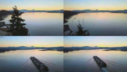 湖泊游船晚霞水面生态自然航拍高清在线视频素材下载