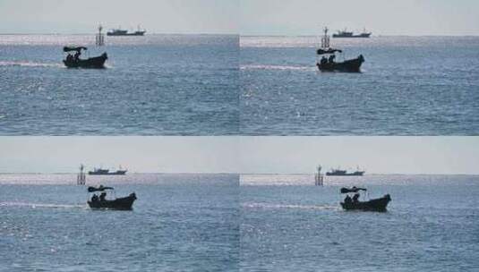 中国海南三亚阳光下海上渔船风光高清在线视频素材下载