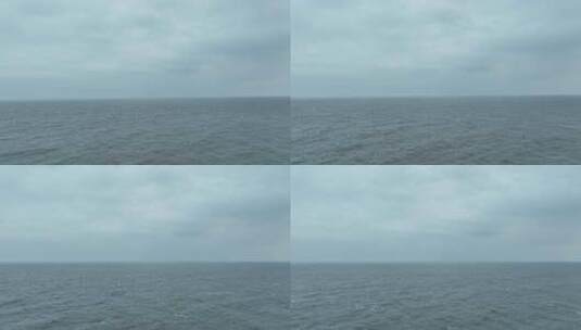 阴天大海航拍海面飞行海平面飞越大海下雨天高清在线视频素材下载