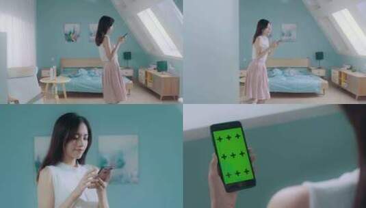 女生窗边玩手机屏幕绿幕抠图抠像4k高清在线视频素材下载