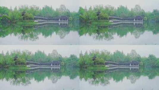 江南西湖浴鹄湾春天春雨中的亭台楼阁水榭高清在线视频素材下载