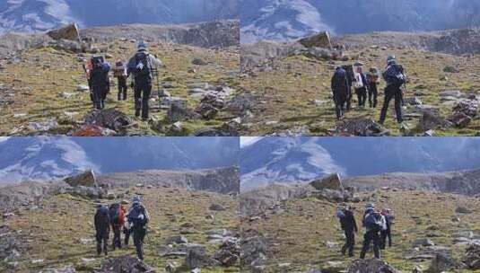 攀登四川雪宝顶的登山者徒步进山高清在线视频素材下载