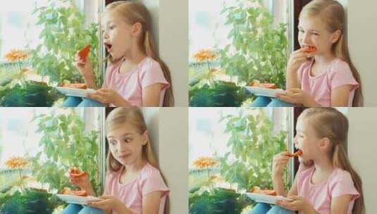 女孩吃甜椒并点头高清在线视频素材下载
