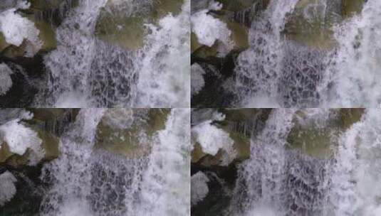冬天流经岩石的水高清在线视频素材下载