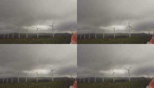 山顶风力发电机群高清在线视频素材下载