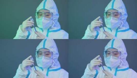 亚洲中国人女士穿医用防护服工作实验做核酸高清在线视频素材下载