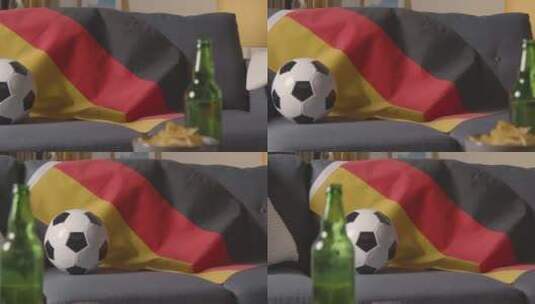 沙发上的德国国旗和足球高清在线视频素材下载
