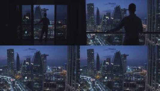 男人站在迪拜摩天大楼的阳台看夜景高清在线视频素材下载