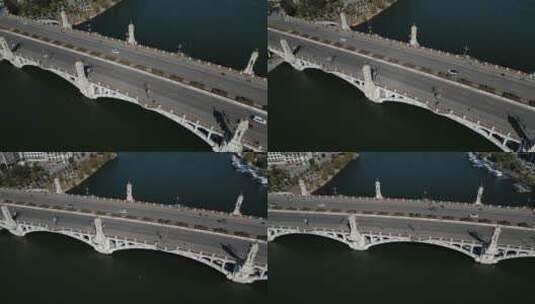 大理洱海上的兴盛大桥航拍高清在线视频素材下载