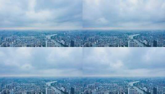 广州珠江岸城市建筑群与天空云雾航拍延时高清在线视频素材下载