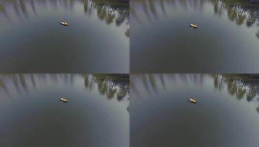 航拍小船在湖面高清在线视频素材下载