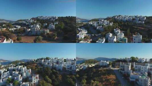博德鲁姆，土耳其
鸟瞰白色彩绘房屋、树木和400。高清在线视频素材下载